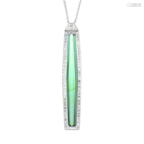 A tourmaline and diamond pendant. The tapered