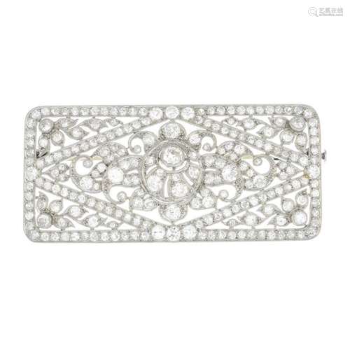 An Art Deco platinum diamond brooch. Of openwork