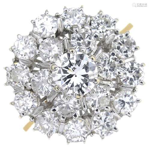 A diamond cluster ring. The brilliant-cut diamond, with