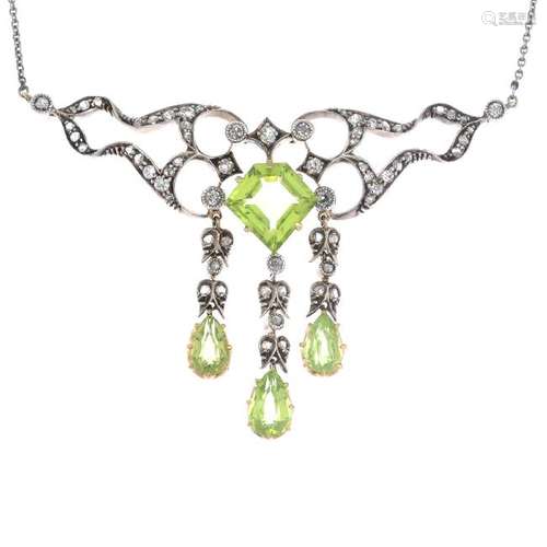 An early 20th century silver and gold, peridot and