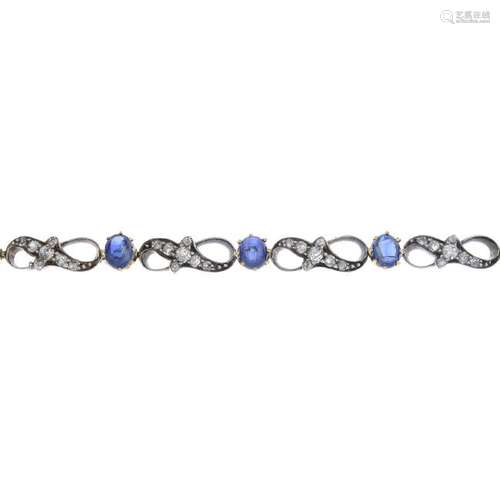 A sapphire and diamond bracelet. The oval sapphire