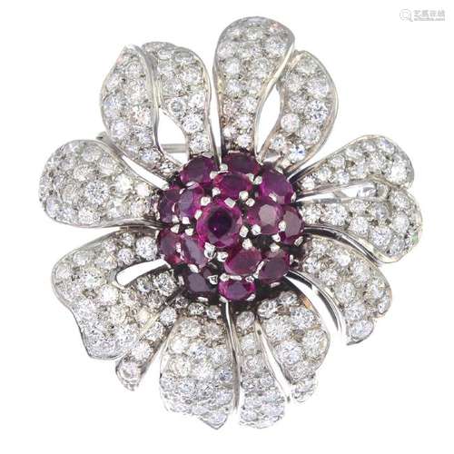 A mid 20th century ruby and diamond floral brooch. The