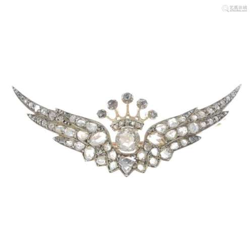 A late Victorian silver and gold diamond brooch. The