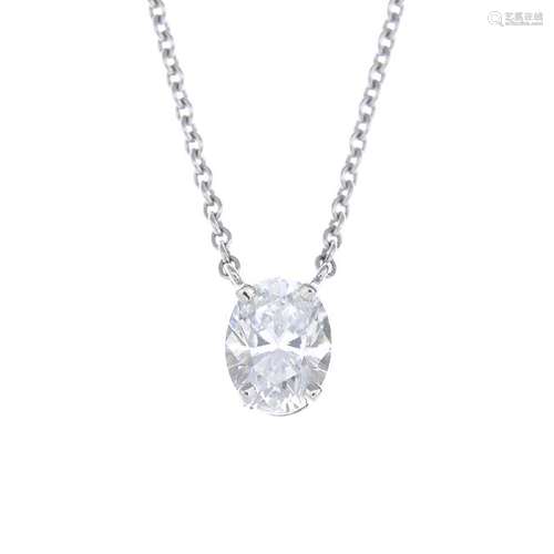 An 18ct gold diamond single-stone pendant. The