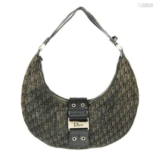 CHRISTIAN DIOR - a small hobo handbag. Designed with a