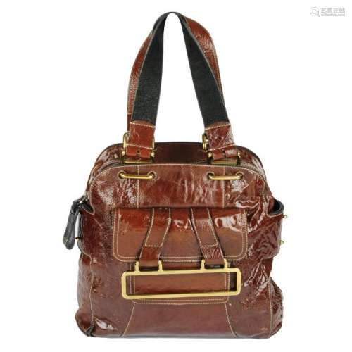 CHLOÉ - a brown glossed leather handbag. Crafted from