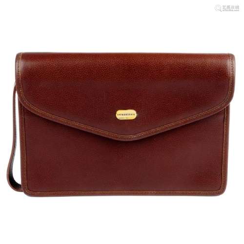 BURBERRY - a brown leather clutch. Featuring a brown
