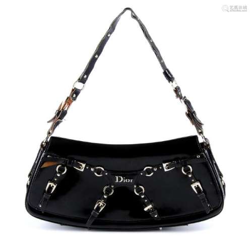CHRISTIAN DIOR - a black coated leather buckle baguette