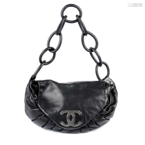 CHANEL - a Lambskin Pleated CC Flap handbag. Crafted