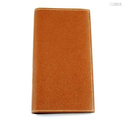 HERMÈS - an Epsom bifold wallet. Crafted from textured