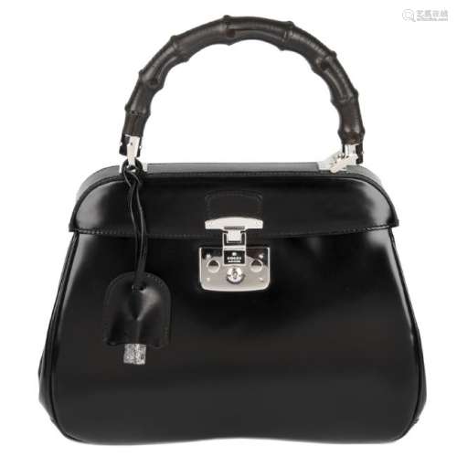 GUCCI - a Medium Lady Lock Bamboo Top Handle handbag.