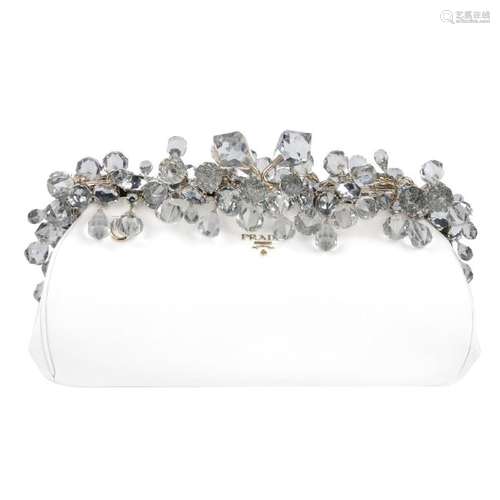 PRADA - a Spazzolato embellished clutch. Crafted from