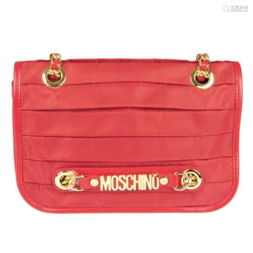MOSCHINO - a red pleated nylon handbag. Crafted from