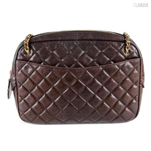 CHANEL - a large brown calf leather quilted camera