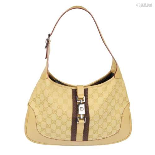 GUCCI - a Jackie Web handbag. Featuring maker's gold GG