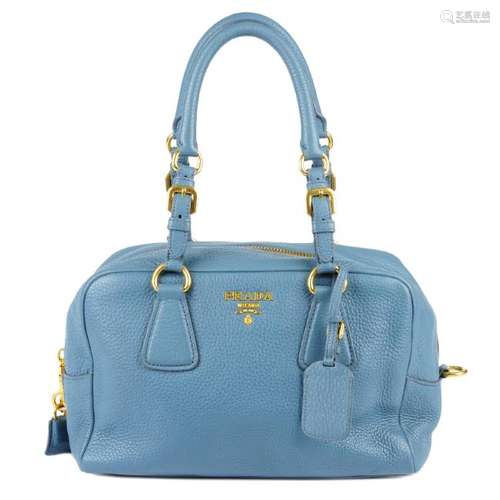 PRADA - a blue Vitello Daino handbag. Designed with a