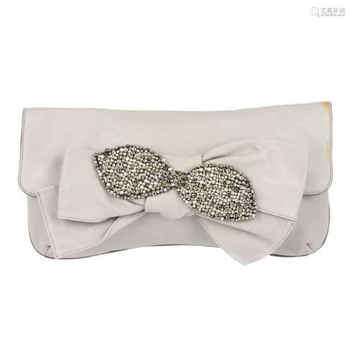 CHLOÉ - an embellished bow clutch. Crafted from dove