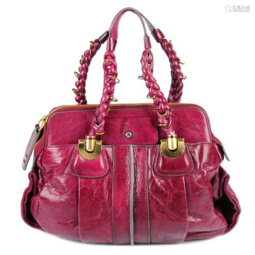 CHLOÉ - a burgundy Heloise handbag. Crafted from