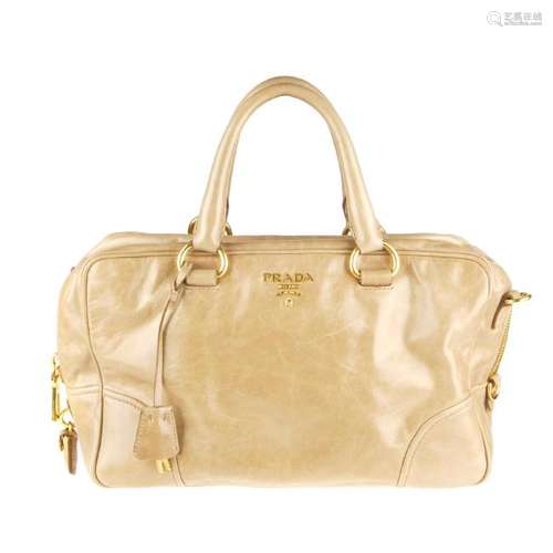 PRADA - a beige Boston handbag. Featuring a glazed