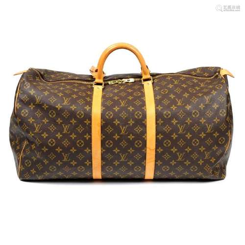 LOUIS VUITTON - a Monogram Keepall 60 luggage bag.