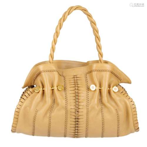 BULGARI - a ruched leather handbag. Crafted from tan