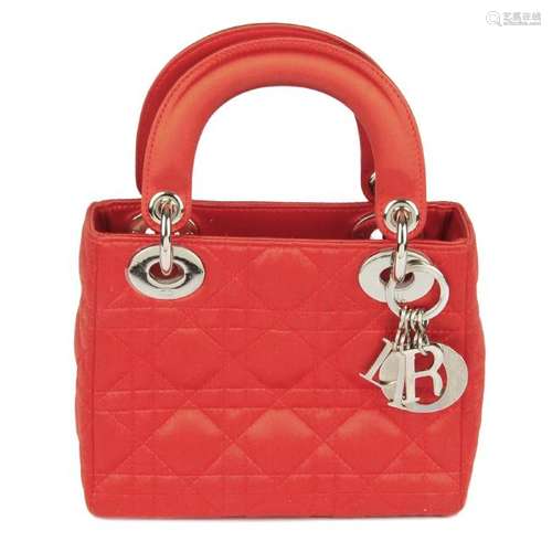 CHRISTIAN DIOR - a red satin Cannage Mini Lady Dior