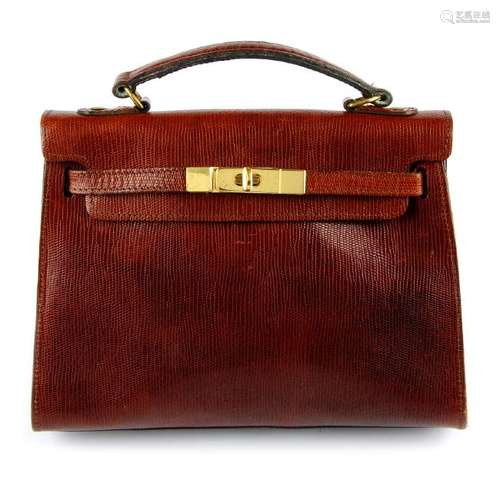 MULBERRY - a vintage Kelly-style handbag. Crafted from