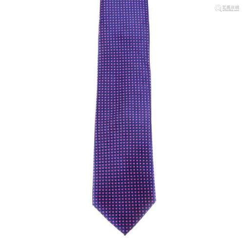 BRIONI - a silk tie. Designed with a purple and pink