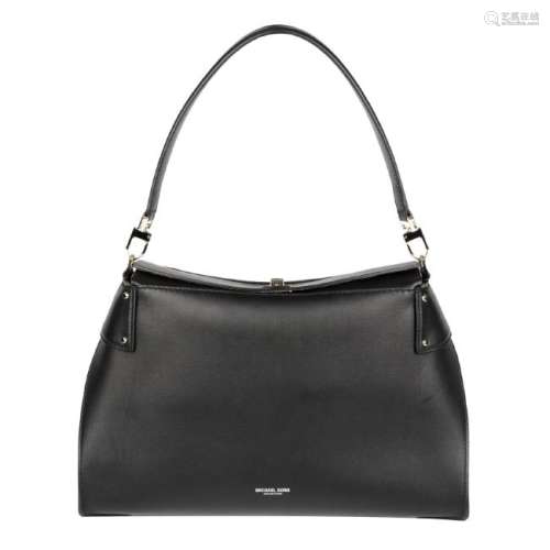 MICHAEL KORS - a black leather handbag. Featuring a