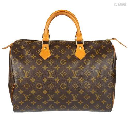 LOUIS VUITTON - a Monogram Speedy 35 handbag. Designed