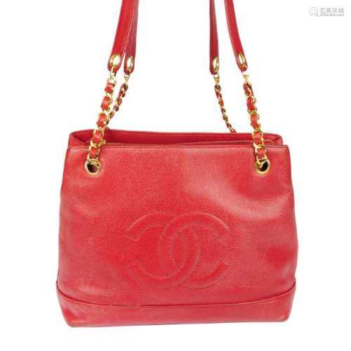 CHANEL - a vintage red Caviar leather handbag. The