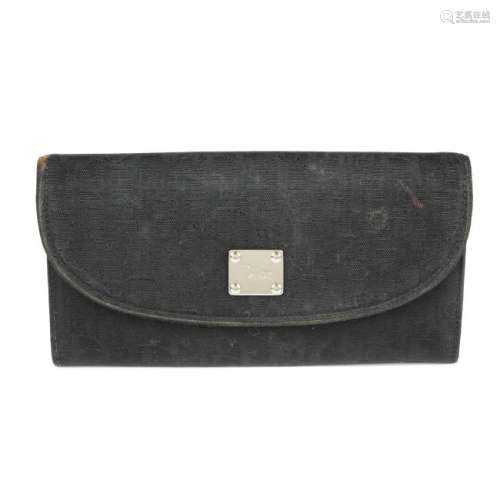 CHRISTIAN DIOR - a canvas wallet. Crafted from the
