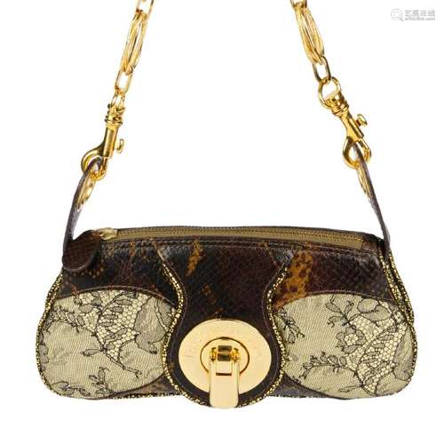 DOLCE & GABBANA - a baguette handbag. Designed with