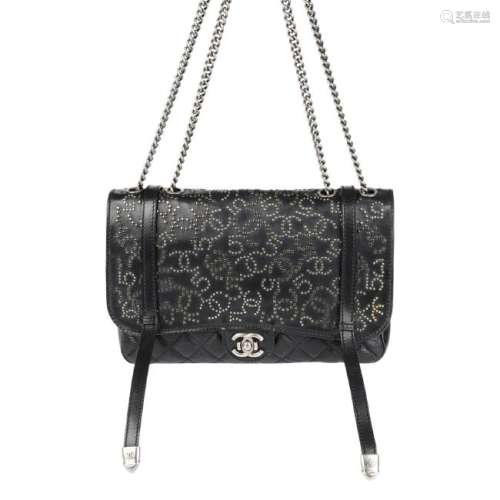 CHANEL - a Studded Dallas Flap handbag. Crafted from