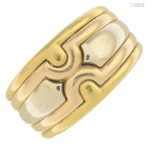 BULGARI - an 18ct gold band ring. Designed as a