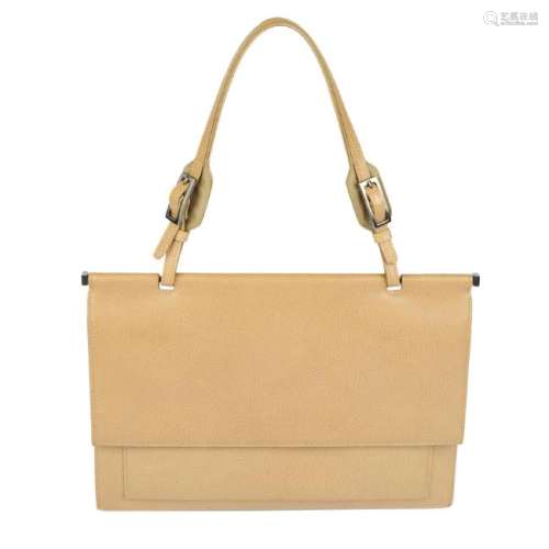 GUCCI - a leather handbag. Designed with a beige