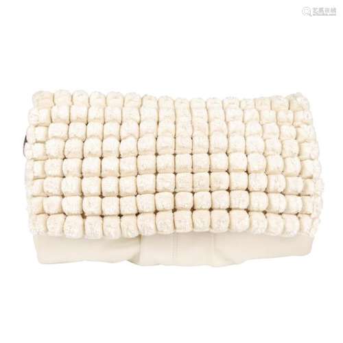 STELLA MCCARTNEY - a pom-pom clutch. featuring a cream