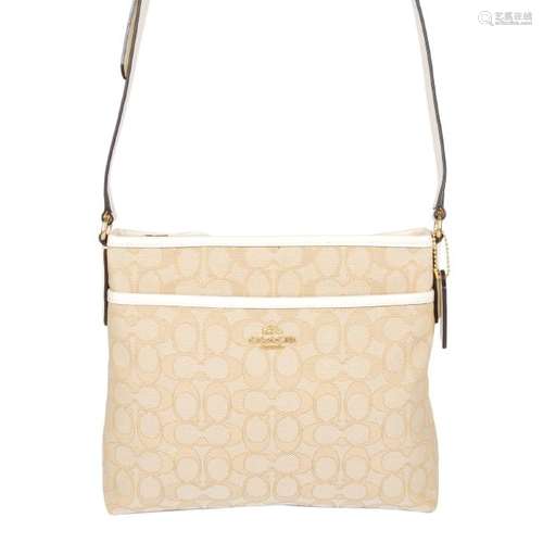 COACH - a Signature File crossbody handbag. Designed