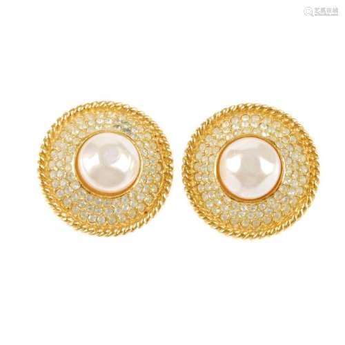 CHANEL - a pair of clip-on earrings. Of circular