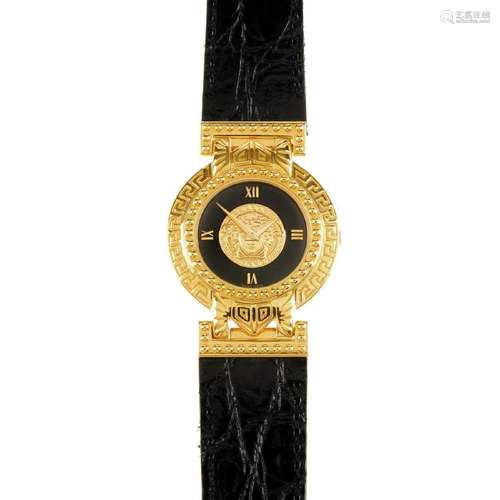 GIANNI VERSACE - a gold plated Medusa wrist watch.