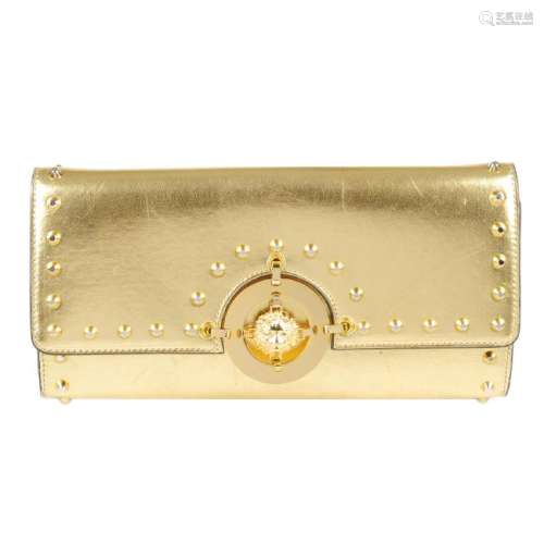 VERSUS BY VERSACE - a gold leather clutch. Crafted from