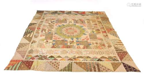 A mid-20th century patchwork quilt,