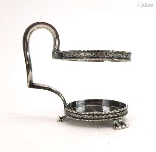 An early 20th century Russian silver tea glass or podstakannik holder of typical form,