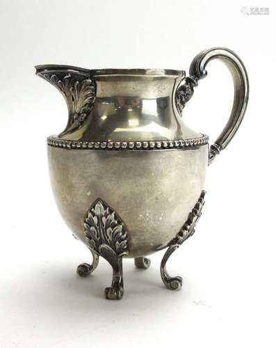 A metalware cream jug of vase shaped form decorated in the Neo-Classical manner, marks rubbed, h.