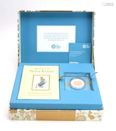 The Royal Mint limited edition 'The Tale of Peter Rabbit Coin and Book Gift Box' including a 22ct