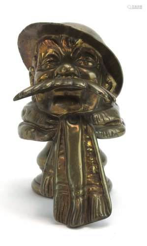 A brass mascot modelled as 'Old Bill', signed Bruce Bairnsfather to the hat, on the matching stand,