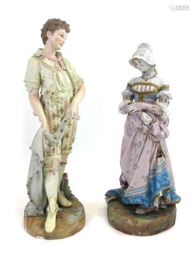 A pair of large scale Continental figures modelled as a dandy and his female companion, max h.