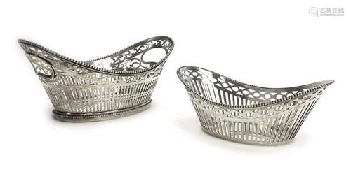 A Dutch silver two handled pierced basket of boat shaped form, w. 17.