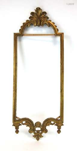 A near pair of Classical-type gilt-metal wall mirror frames surmounted by scrolled pediments,