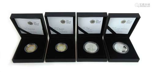 Four cased silver coins including 'Restoration of the Monarchy' £5 proof coin,